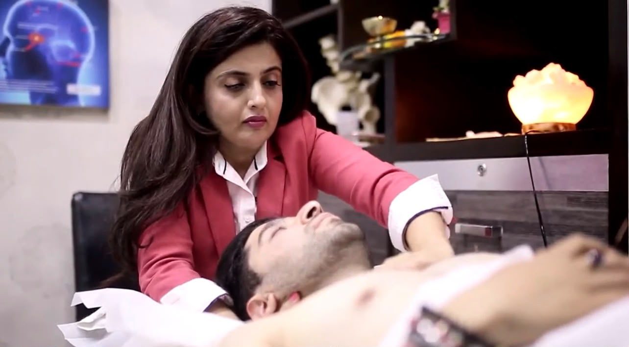 Dr. Vandana performing a cranial hold